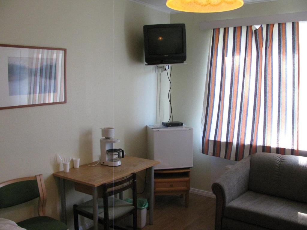 Asuntohotelli Huvikumpu Otava Camera foto